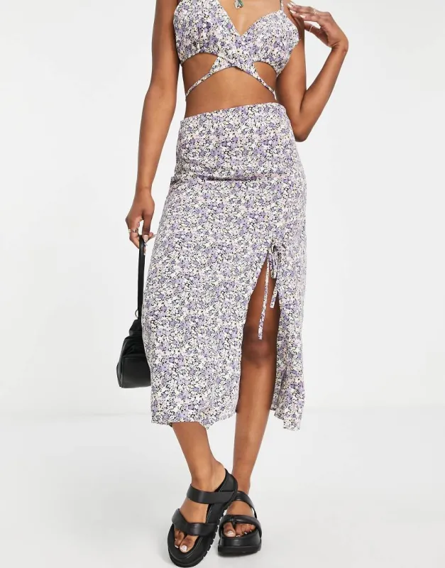 Only ruched midi skirt in purple ditsy floral sold by ASOS