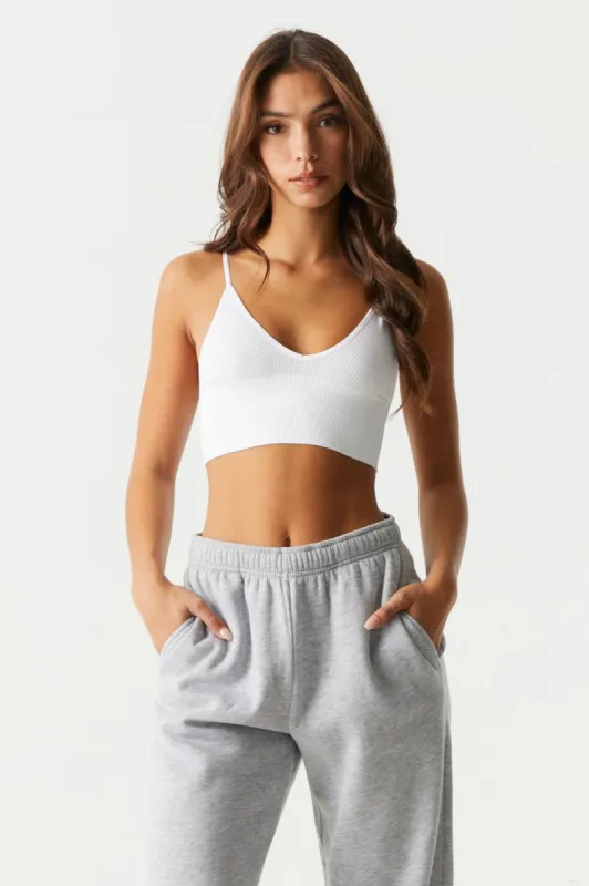White Seamless Ribbed V-Neck Bralette sold by Charlotte Russe