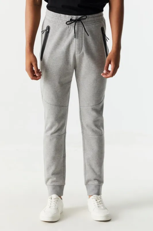 Rubber Zip Pocket Fleece Jogger sold by Charlotte Russe