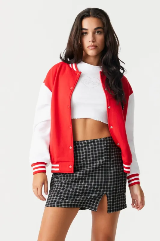 High-Rise Plaid Leg Slit Mini Skirt sold by Charlotte Russe