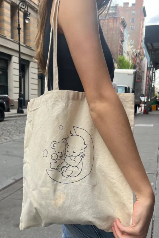 Sleeping Cherub Tote Bag sold by Brandy Melville