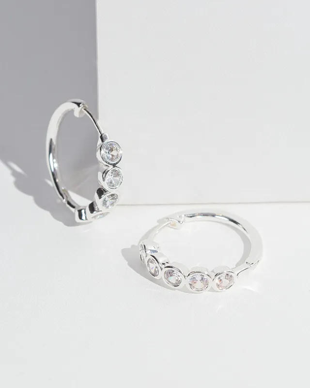 Crystal Huggie Hoop Earrings sold by Collete Hayman