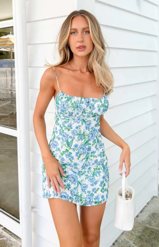 Isabel White Floral Mini Dress sold by Beginning Boutique