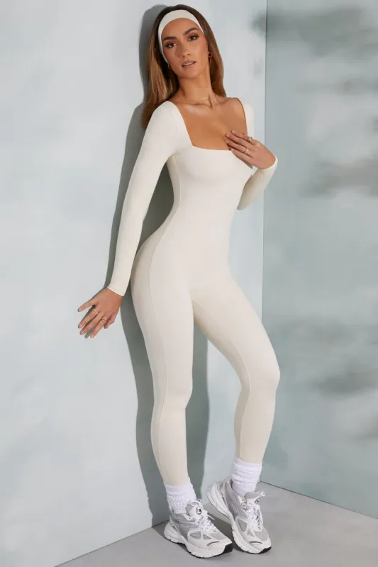 Tall Square Neck Long Sleeve Jumpsuit in Ivory sold by Oh Polly