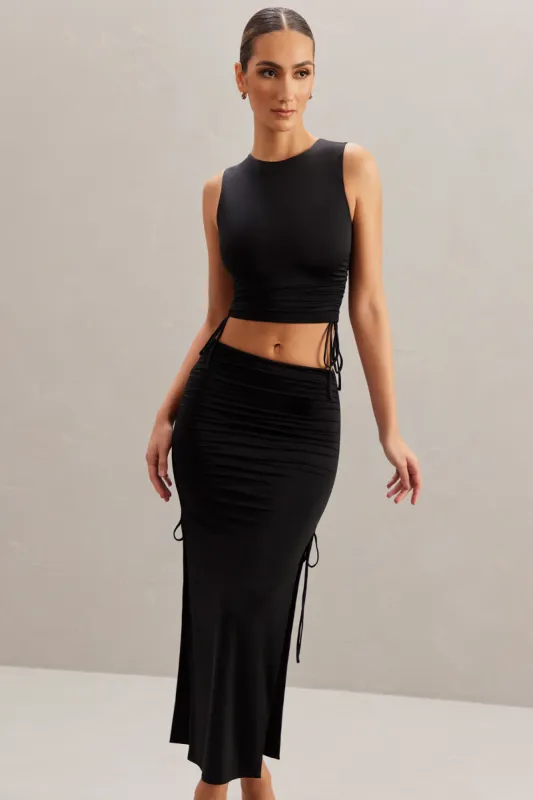 Mid Rise Midi Skirt in Black sold by Oh Polly