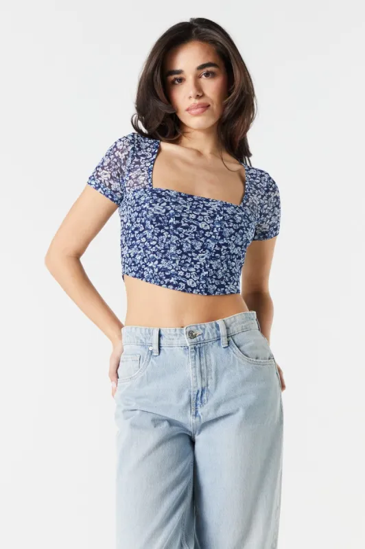 Corset fleuri bleu avec manches en filet sold by Urban Planet