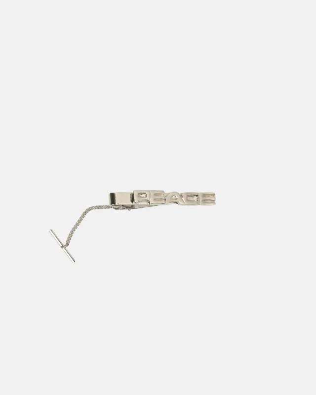 PEACE TIE CLIP sold by Stussy
