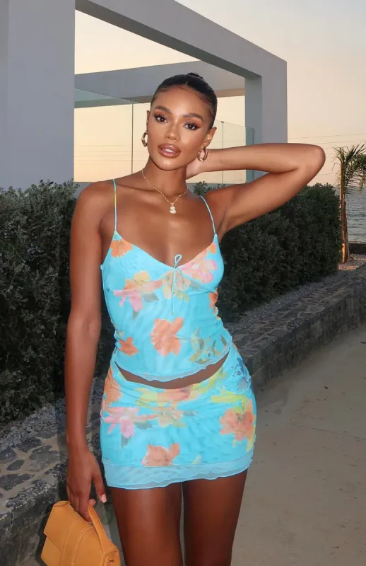 Are You Entertained Mini Skirt Sky Blue Floral sold by White Fox Boutique