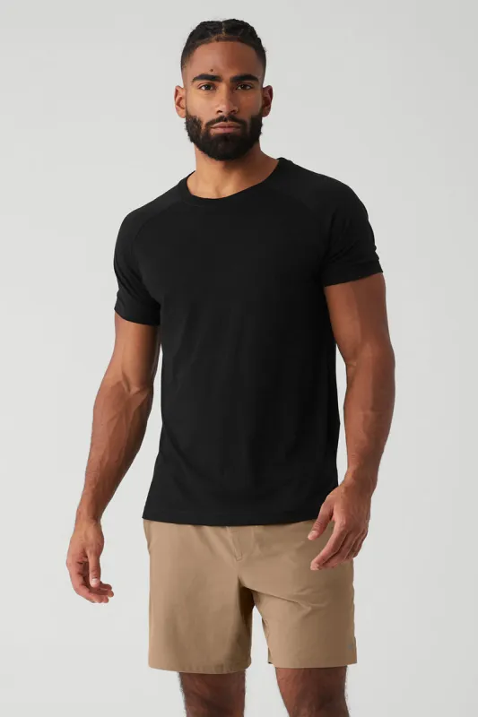 Triumph Raglan Tee - Black sold by Alo Yoga