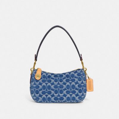 Swinger In Signature Denim sold by Coach