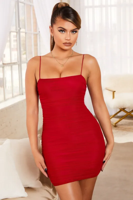 Simply Bliss Ruched Mesh Bodycon Mini Dress in Red sold by Oh Polly
