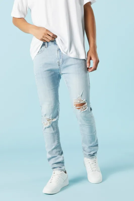 Le jean le plus ajusté en denim d'aspect usé délavé pâle sold by Urban Planet