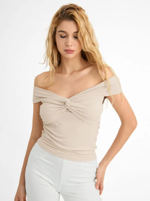Eco-SkinKiss® Bow-Knot Front Cold-Shoulder Top sold by ogl move