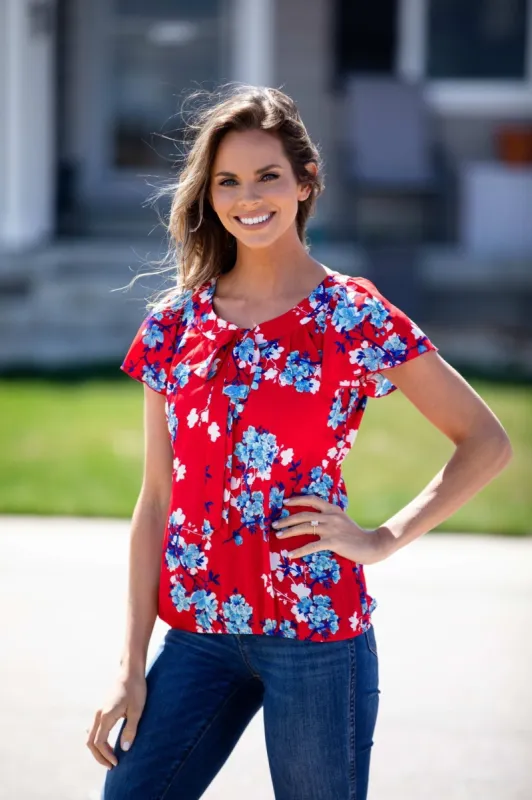 Floral Flutter Sleeve Bubble Hem Blouse sold by Dress Barn