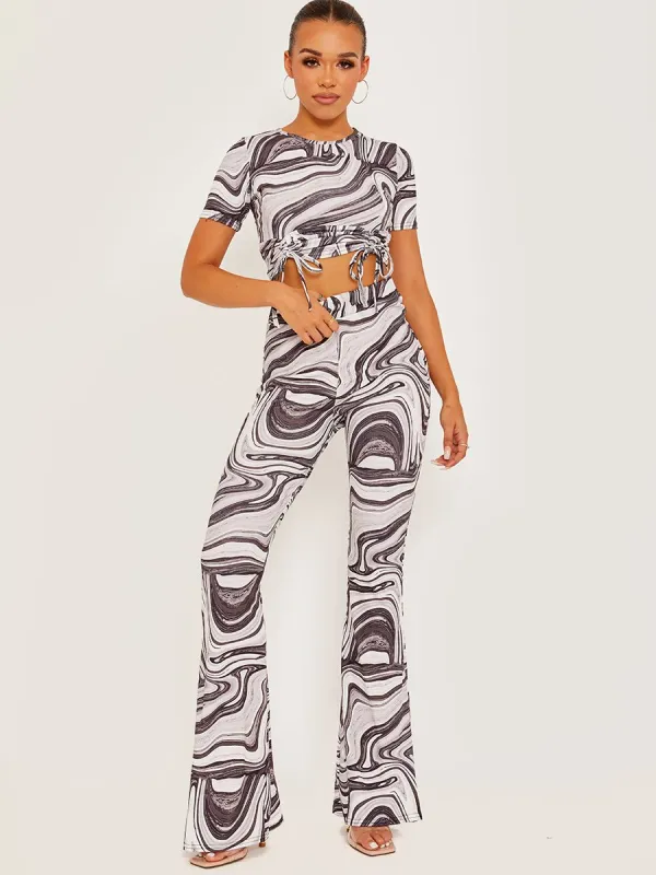 Shayla Marble Print Ribbed Flared Trousers In Grey sold by Vivichi
