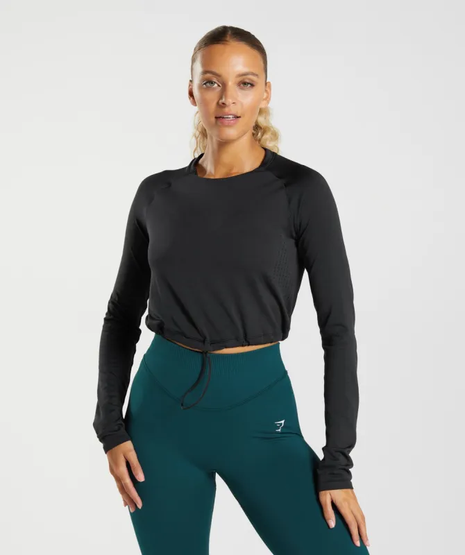 Gymshark Sweat Seamless Long Sleeve Crop Top - Black sold by Gymshark