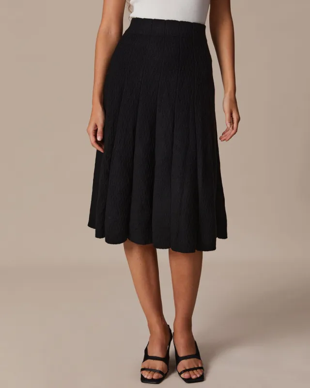 The Black High Waisted Textured Knit Midi Skirt sold by rihoas