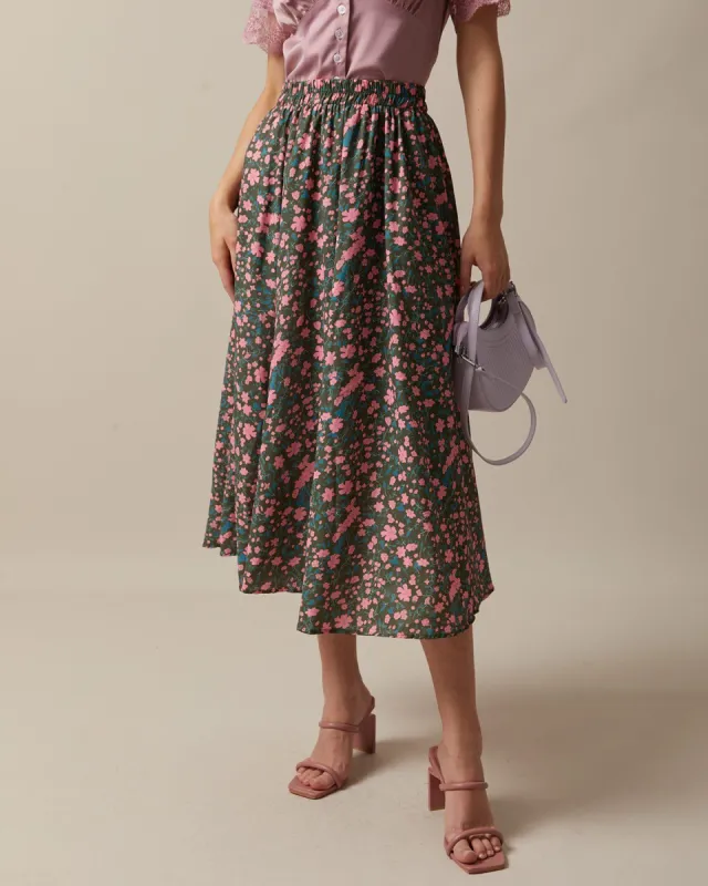 The Pink High Waisted Pleated Floral Midi Skirt sold by rihoas