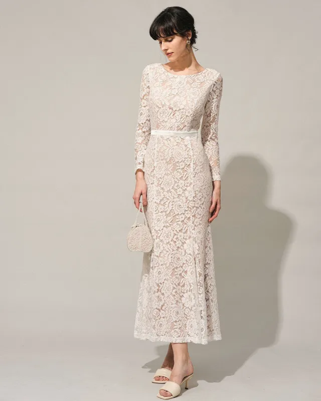 The White Lace Long Sleeve Backless Maxi Dress sold by rihoas