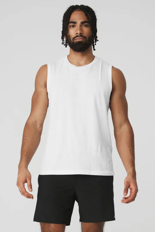 The Triumph Muscle Tank - White sold by Alo Yoga