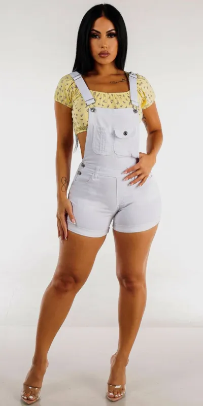 White Cuffed Denim Short Overalls with Yellow Lace Up Back Floral Crop Top sold by Moda
