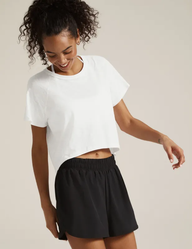 Signature High Low Cropped Tee sold by Beyond Yoga