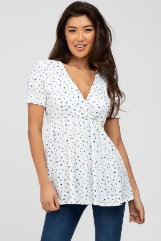 Ivory Ditsy Floral Smocked Sleeve Wrap Top sold by Pinkblush