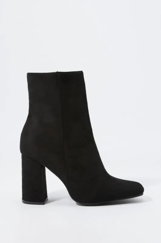 Bottes à talons en similicuir sold by Urban Planet