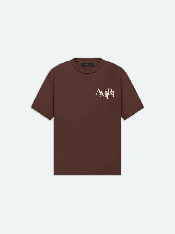 AMIRI STAGGERED LOGO TEE - POTTING SOIL sold by AMIRI