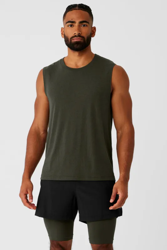The Triumph Muscle Tank - Stealth Green sold by Alo Yoga