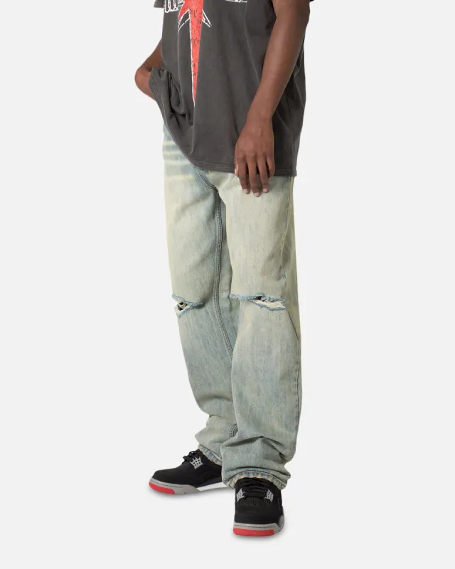 MNML Knee Distressed Ultra Baggy Denim Jeans Vintage Blue sold by Culture Kings