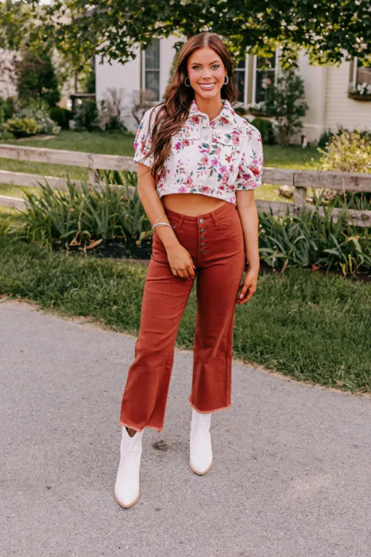 The McKenzie High Waist Jean In Rust sold by Impressions