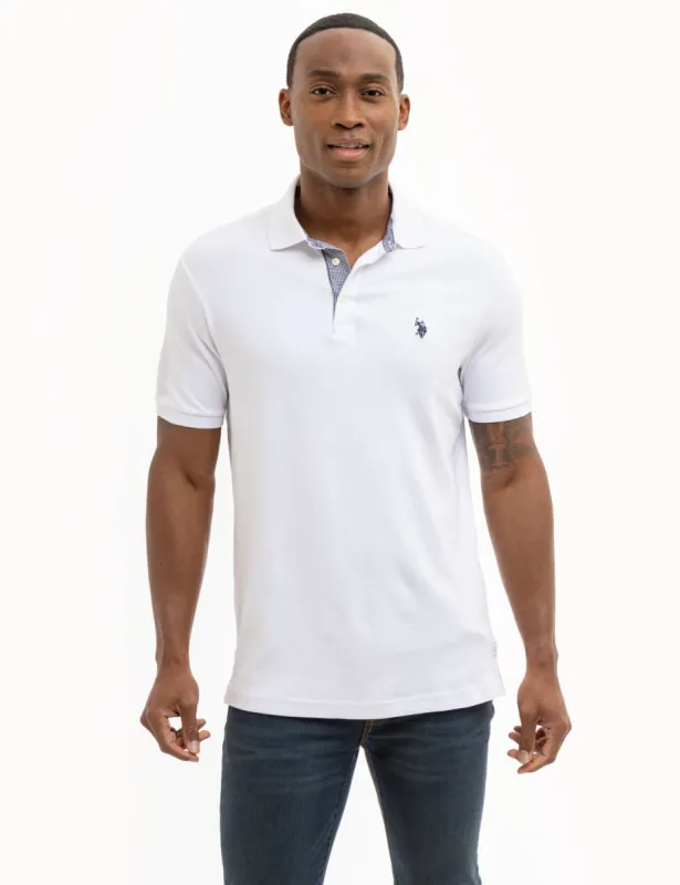 SOLID INTERLOCK GINGHAM TRIM POLO SHIRT sold by U.S. Polo Assn.
