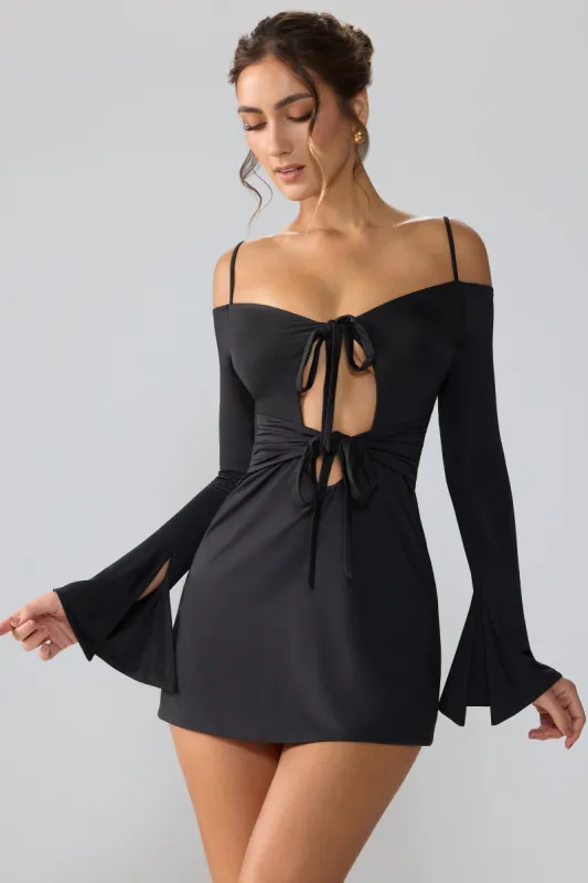 Slinky Jersey Long Sleeve Cut Out Mini Dress in Black sold by Oh Polly