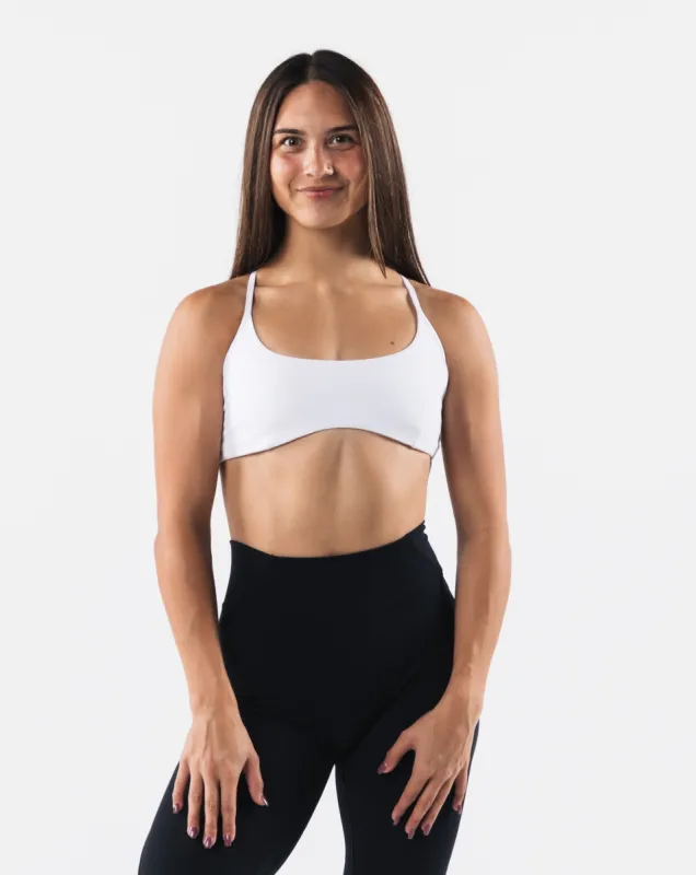 Aura Strappy Bra - White sold by Alphalete