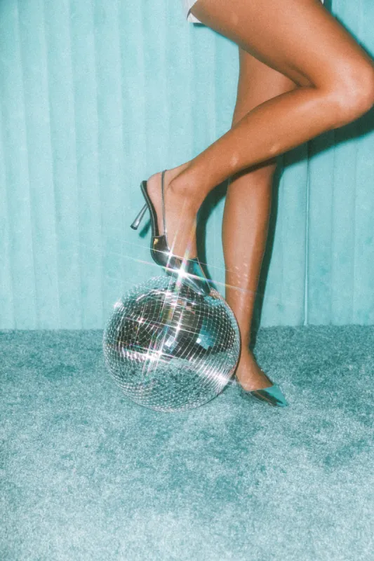 Belinda Pointed Pump in Silver Chrome sold by American Threads