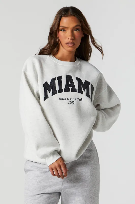 Chandail avec motif brodé Miami en sergé sold by Urban Planet