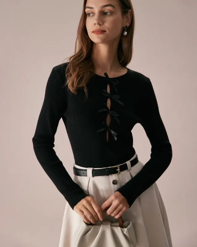 The Black Boat Neck Bowknot Front Knit Top sold by rihoas