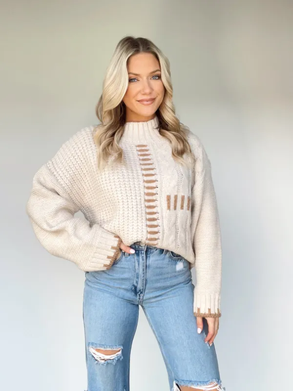 Stitched Together Sweater sold by LANE 201