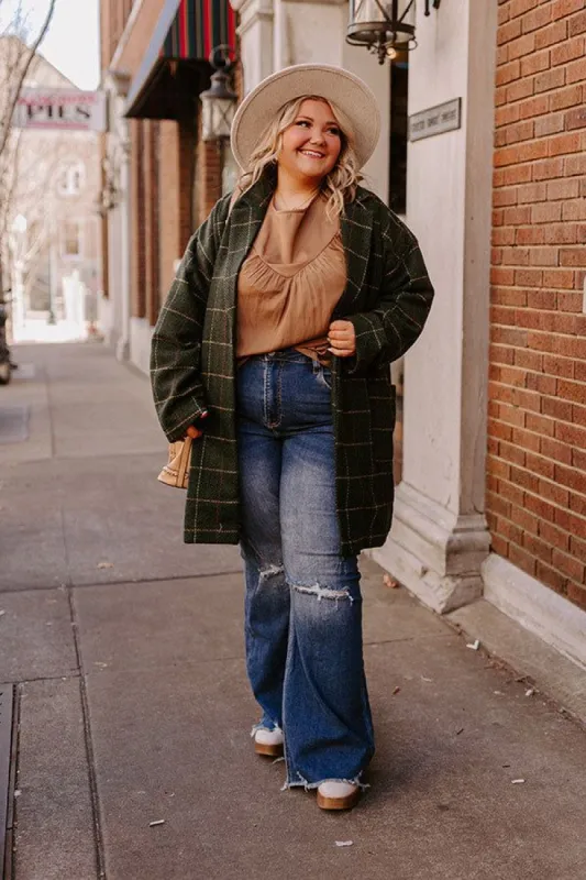 The Laura High Waist Distressed Flare In Dark Wash Curves sold by Impressions