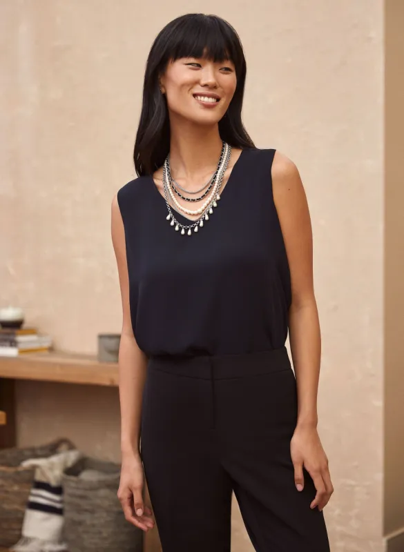 Essential V-Neck Blouse sold by Laura