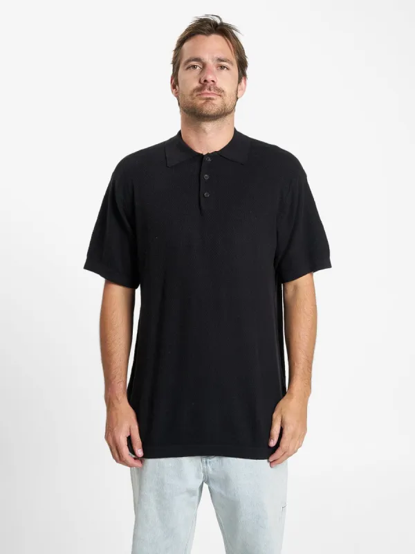 Issued Polo - Black sold by Thrills