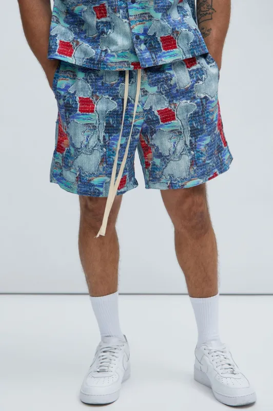 Maui Garden Warmup Shorts - Blue/combo sold by Fashion Nova