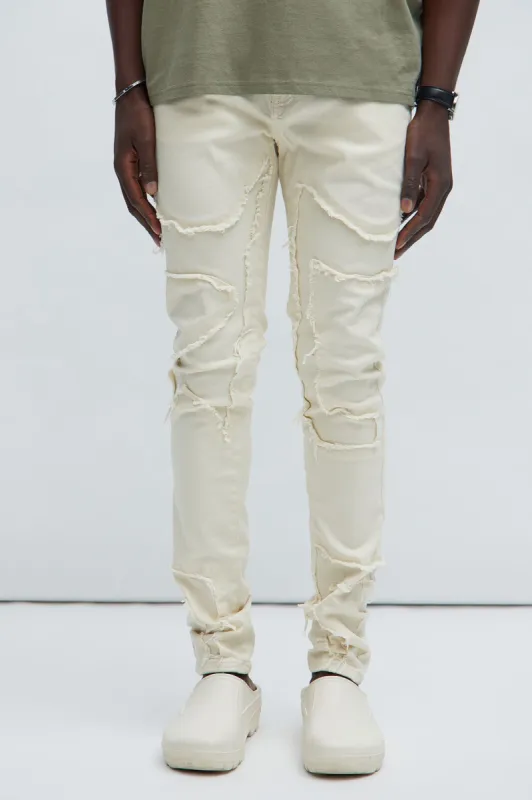 Got Your Back Patched Stacked Skinny Jeans - Off White sold by Fashion Nova