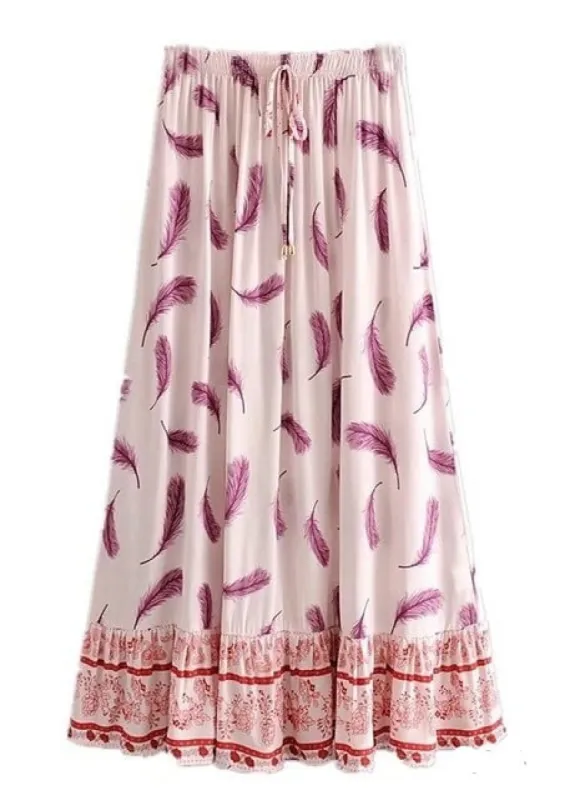 White boho maxi skirt with pink feathers sold by Boho Mood