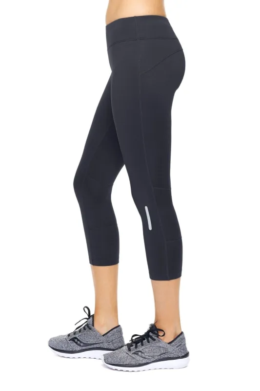 Airstretch Mid-Rise Capri Leggings - Plus sold by Dress Barn