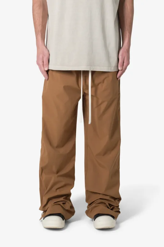 Side Snap Nylon Pants - Brown sold by MNML