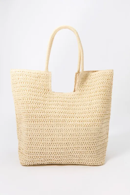 Fourre-tout en raphia sold by Urban Planet