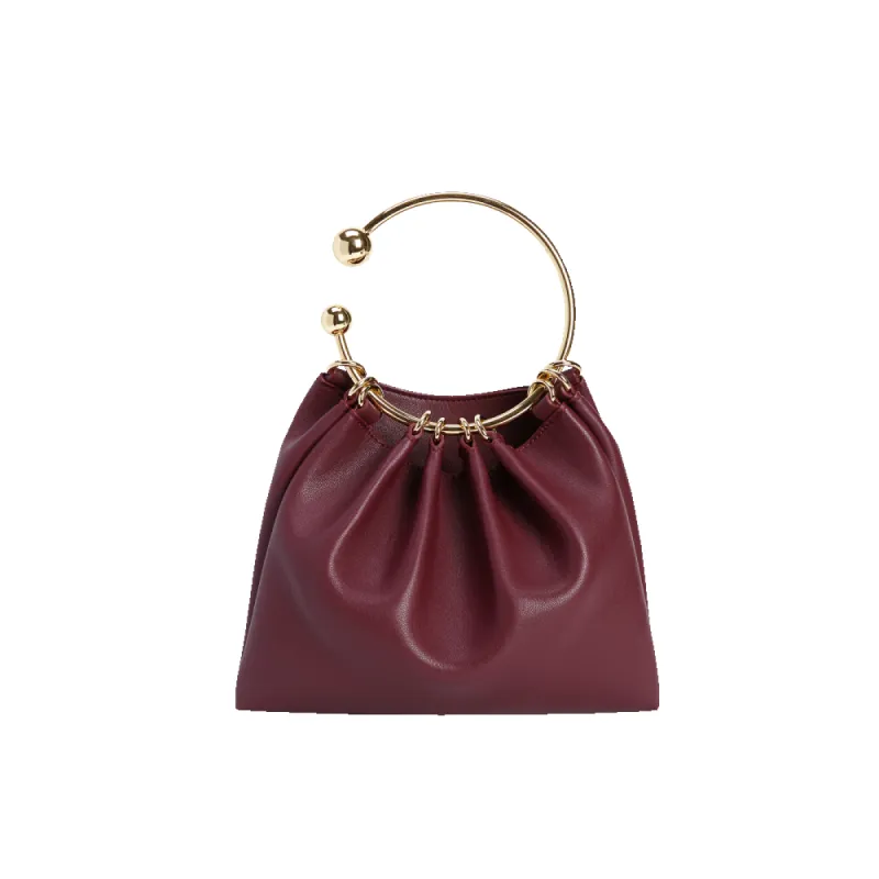 Burgundy Ring Handle Bag sold by VERAFIED