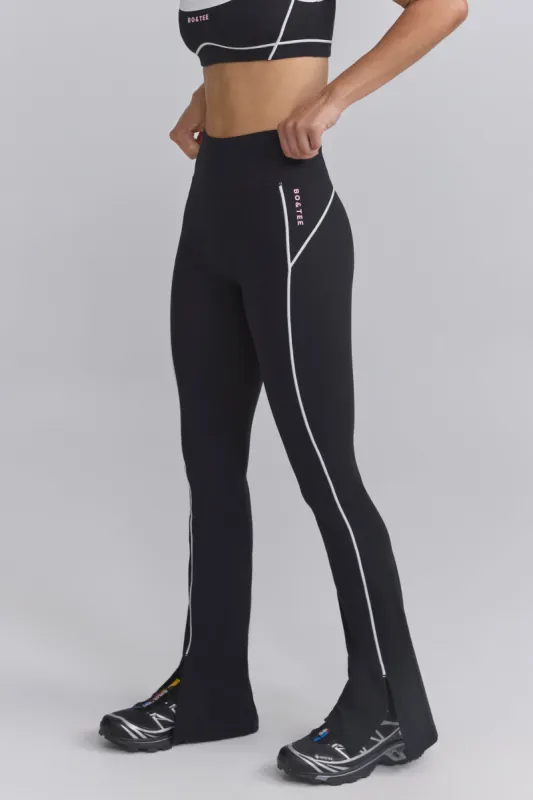 Petite Soft Active Contrast-Trim Flared Trousers in Black sold by Oh Polly